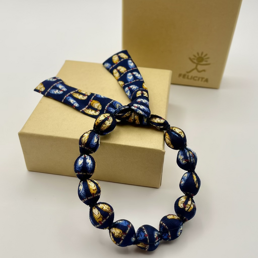 Bracelet perles de soie motifs pérruches