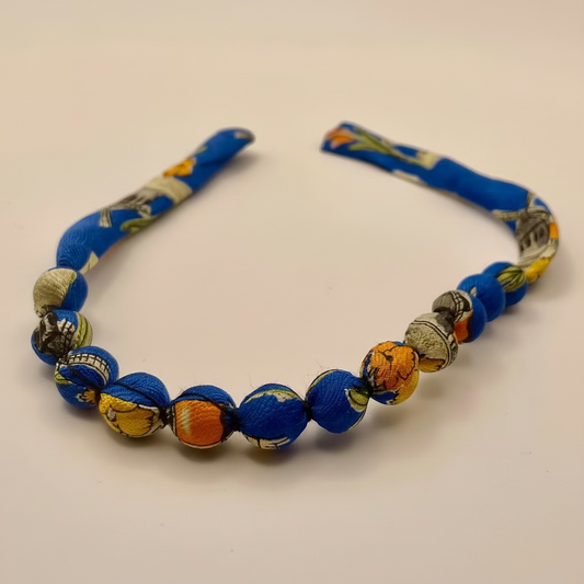 Bracelet perles de soie bleue motifs moulins et pavots