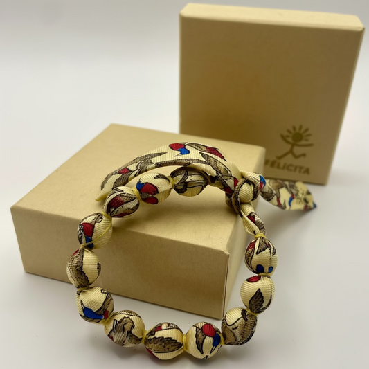 Bracelet perles de soie jaune, motifs canards sauvages