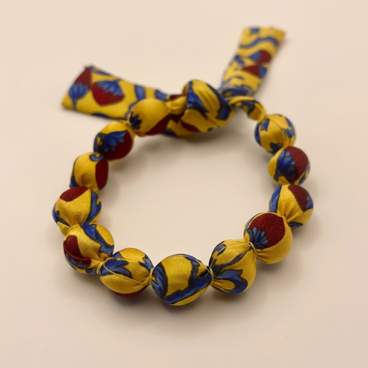 Bracelet perles de soie fruits rouges