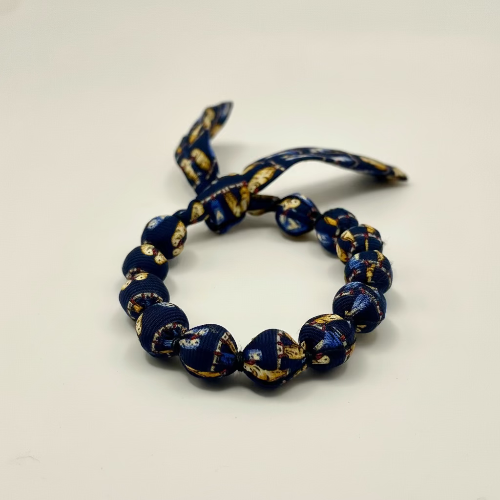 Bracelet perles de soie motifs pérruches