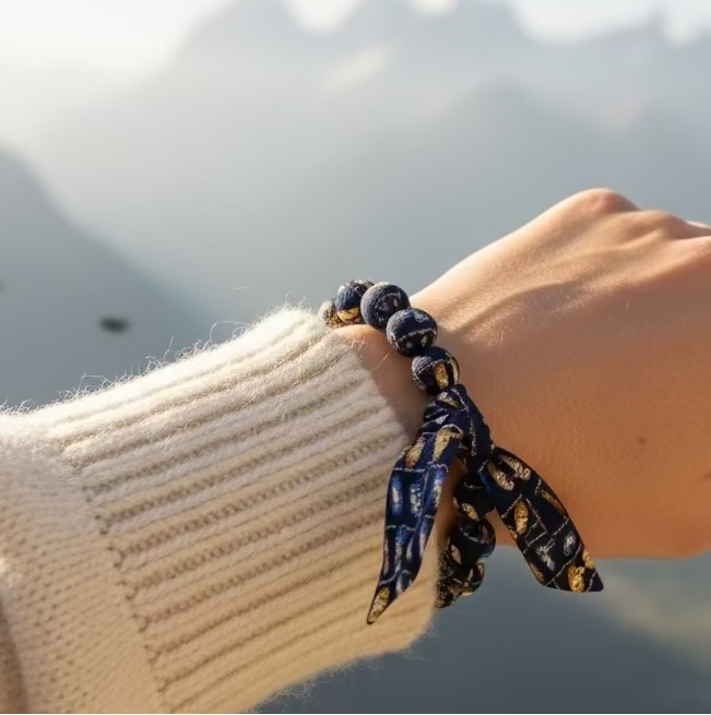 Bracelet perles de soie motifs pérruches