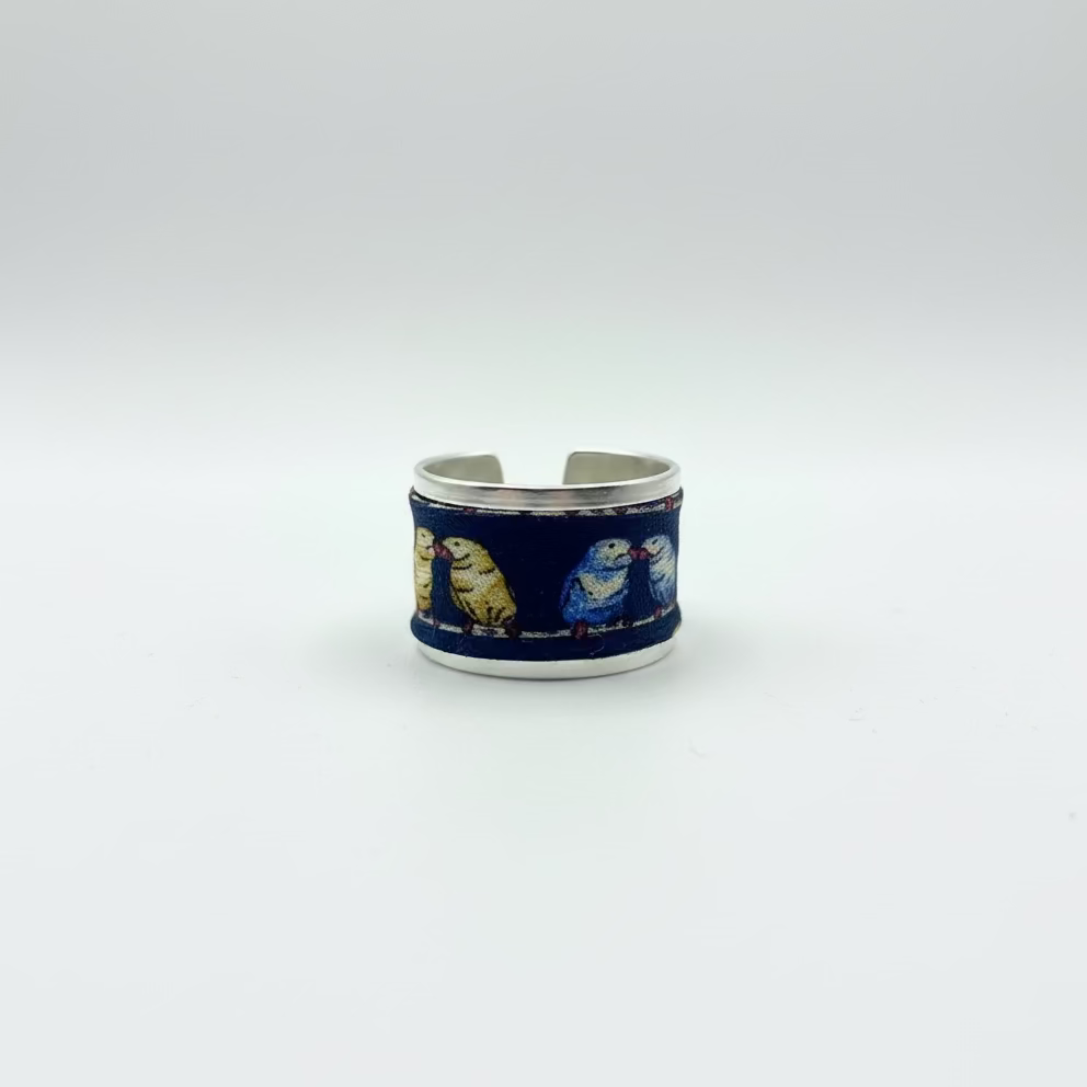 Bague ajustable en acier Rodhier en soie les perruches